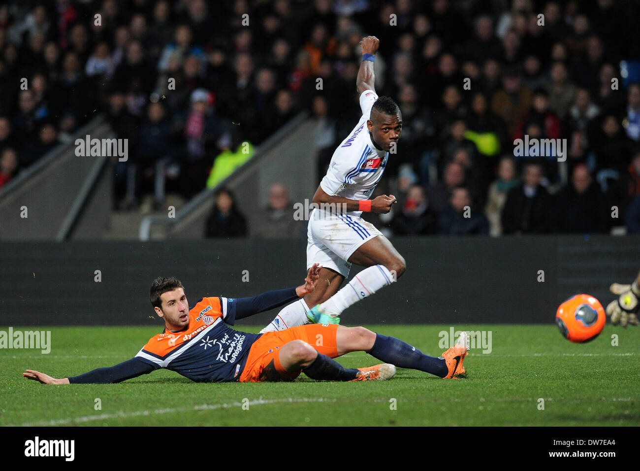 02.03.2014. French League 1 football. Lyon versus Montpellier. Henri Bedimo (Lyon) and Mathieu Deplagne (Montpellier) Stock Photo