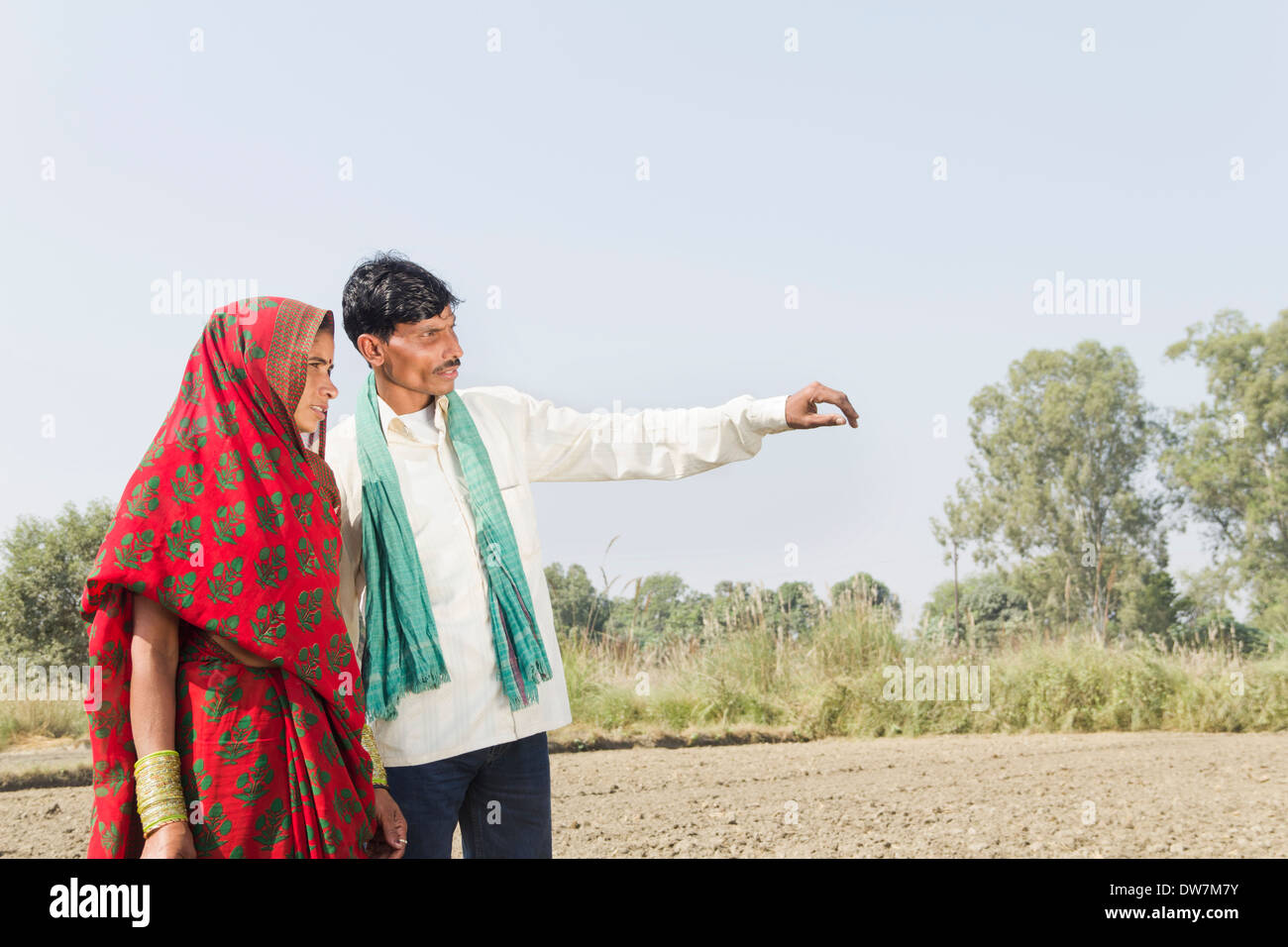 Indian farmer wife standing in hi-res stock photography and images - Alamy