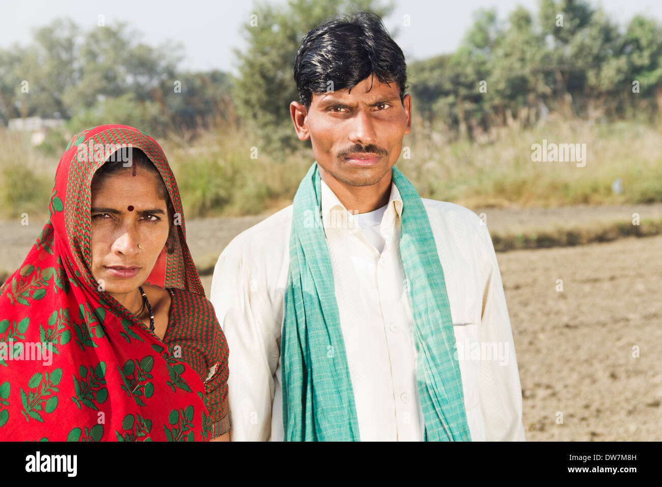 Indian farmer wife standing in hi-res stock photography and images - Alamy
