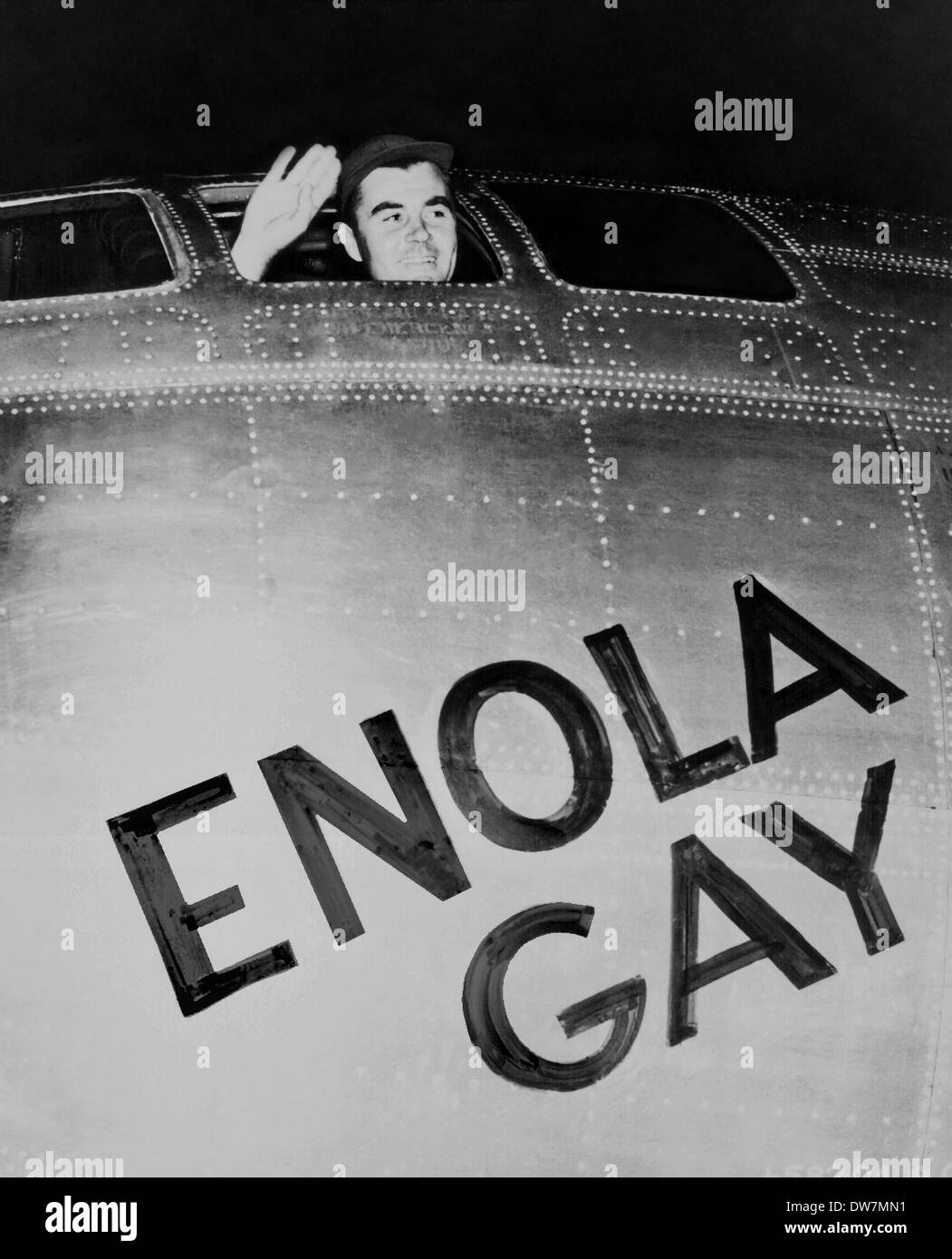 US Air Force Col. Paul W. Tibbets, Jr., pilot of the ENOLA GAY waves from his cockpit of his B-29 Superfortress before takeoff to drop the atomic bomb on Hiroshima, Japan August 6, 1945 from North Filed, Tinian, Mariana Islands. Stock Photo