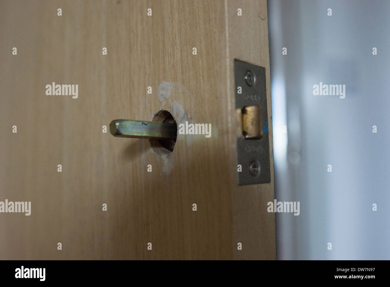 door handle lock grain broken screw driver Stock Photo
