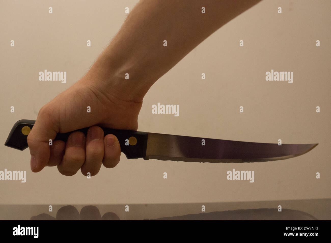 kitchen Knife teenager hand long sharp blade Stock Photo Alamy