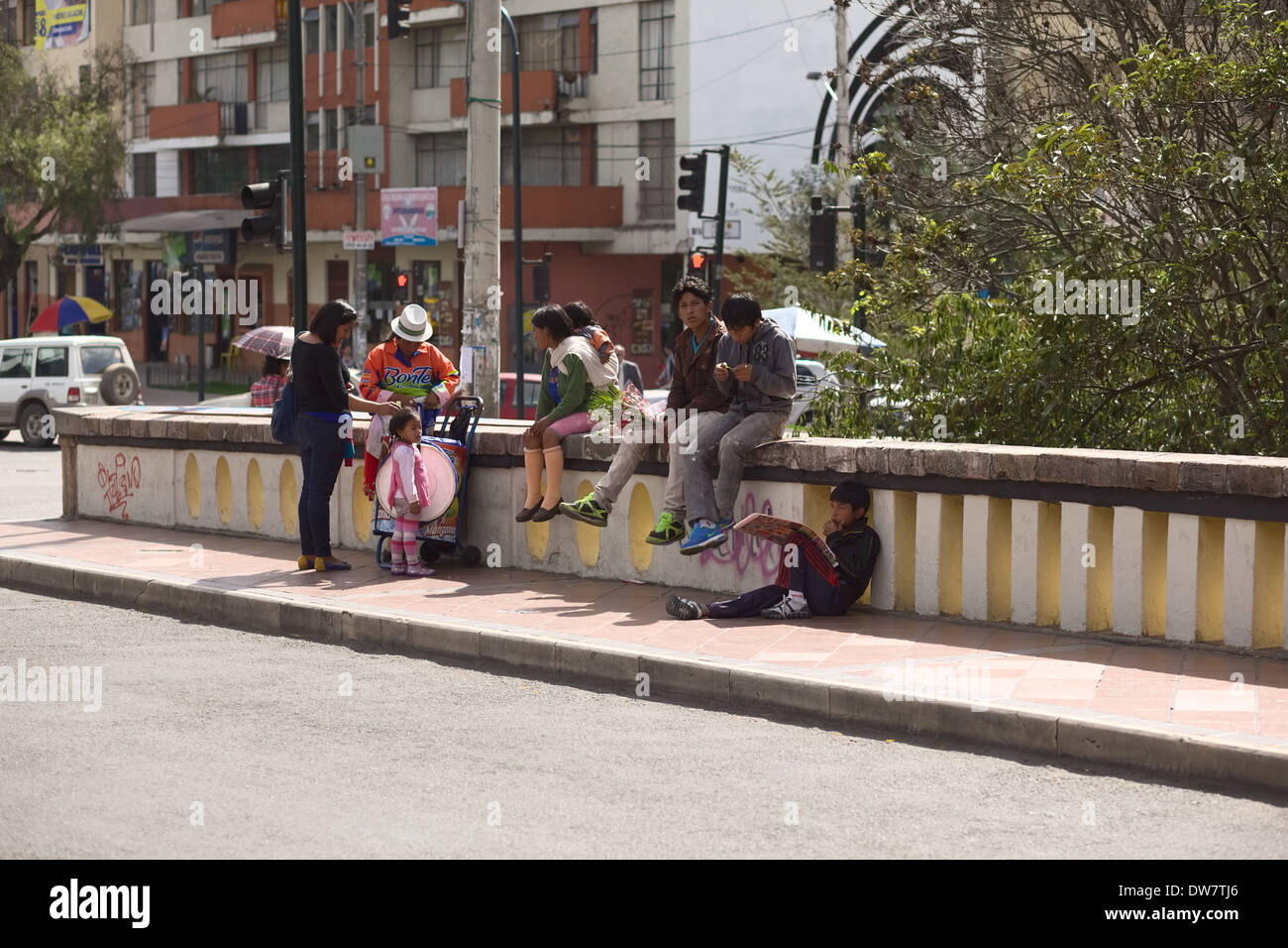 People on the bridge Puente del Centenario (over the river Tomebamba) in the city of Cuenca in Azuay Province, Ecuador Stock Photo
