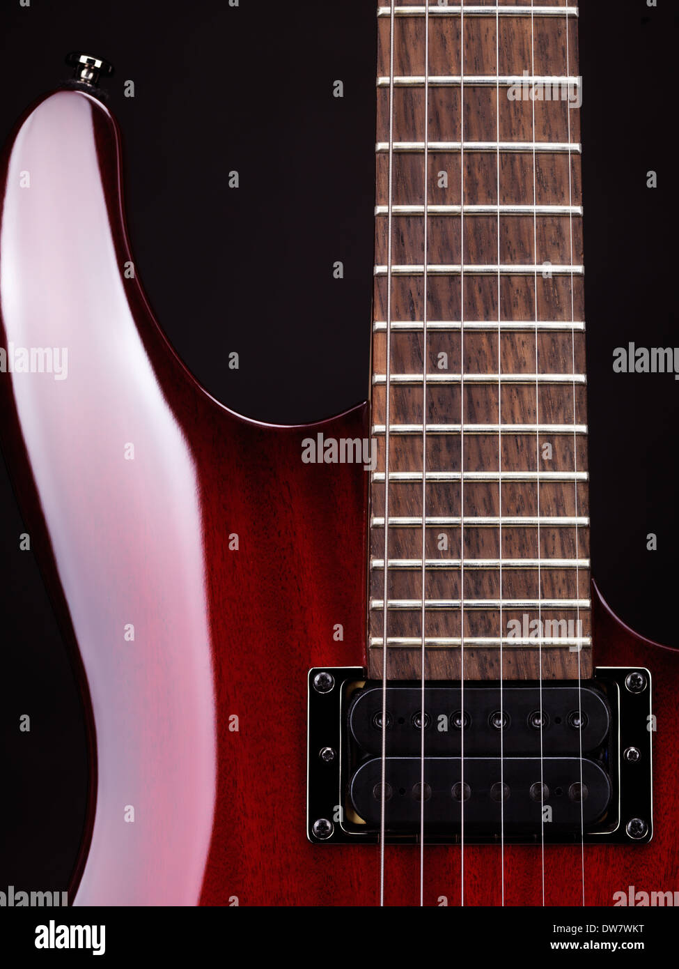 Closeup of electric guitar neck, strings and pickup Stock Photo