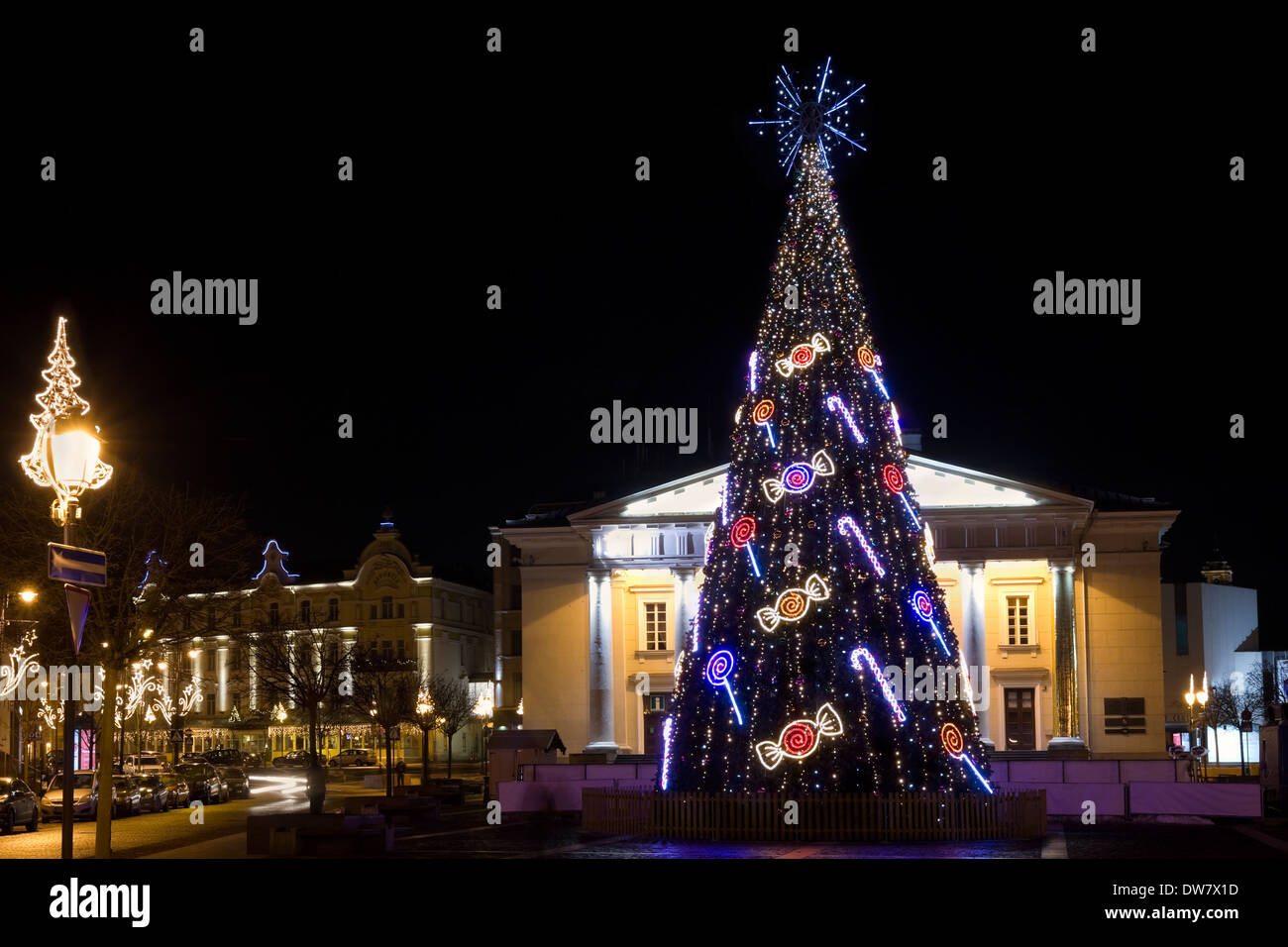 VILNIUS, LITHUANIA - DECEMBER 24: Christmas night on the Rotuse square of the old European city in Vilnius on December 24, 2013. Stock Photo
