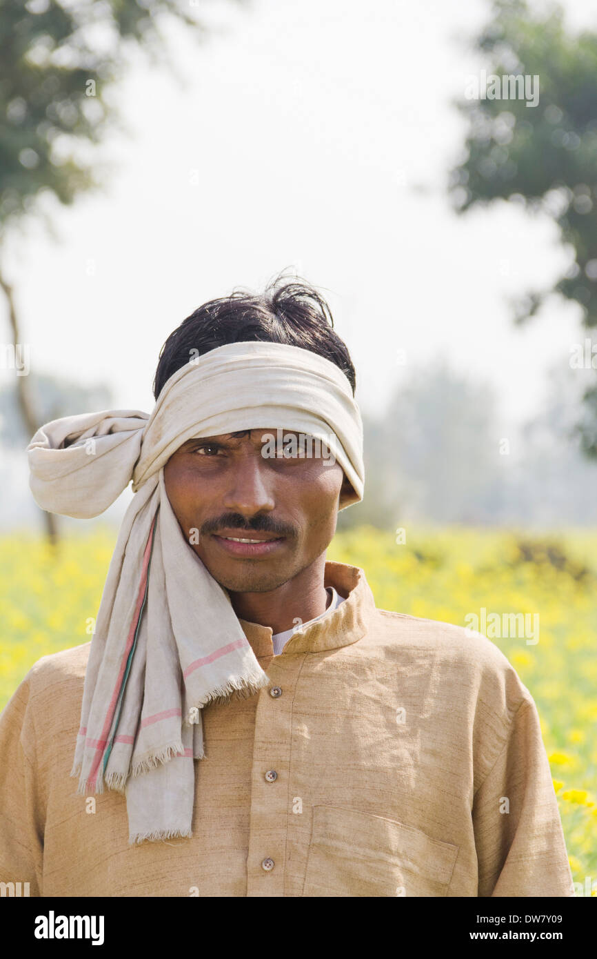 1 Indian famer standing in farms Stock Photo