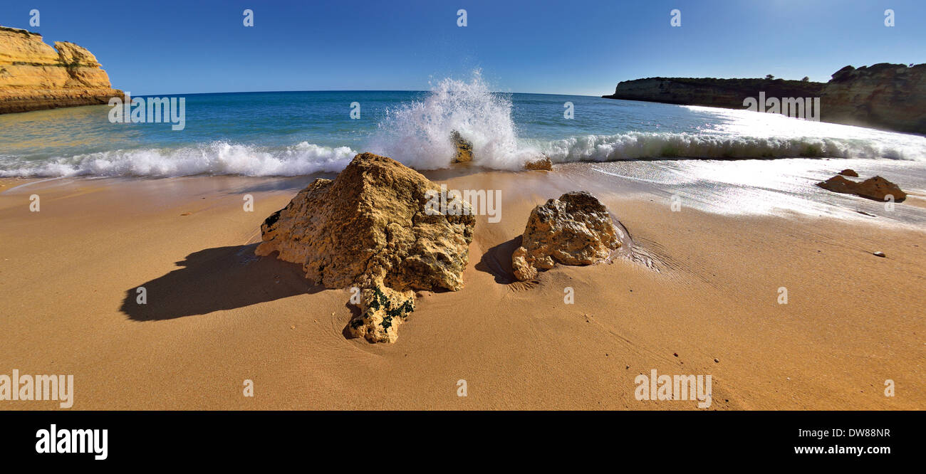 Portugal, Algarve: Waves and rocks at beach Prainha Stock Photo