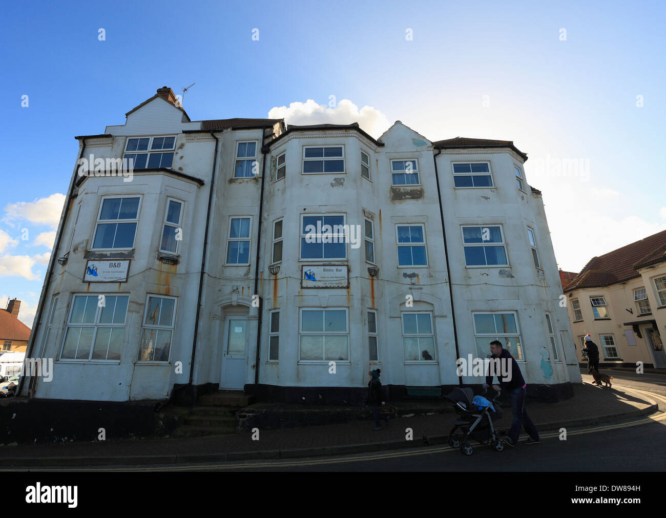 Sheringham seafront hotel which appears to be closed and in need of some attention. Stock Photo