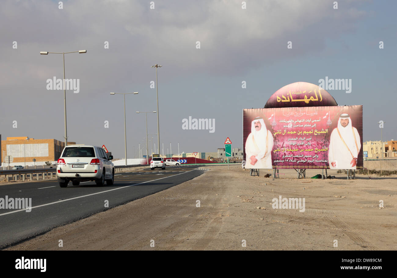 Billboard in Doha with the ruler of Qatar - Hamad Bin Khalifa Al-Thani and his son. Qatar, MIddle East Stock Photo