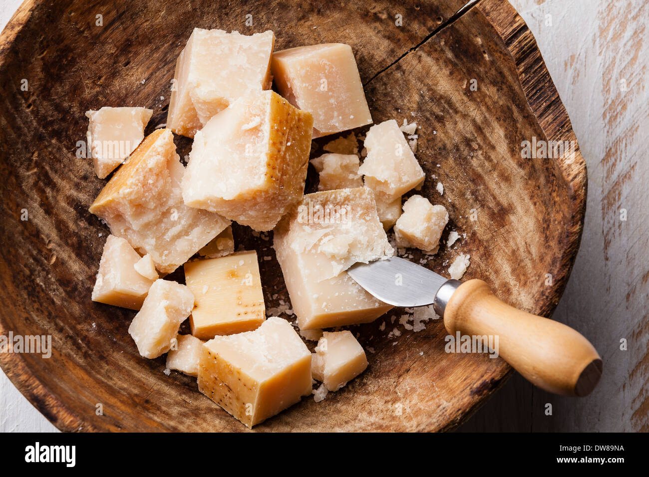 Parmesan cheese on wooden background Stock Photo