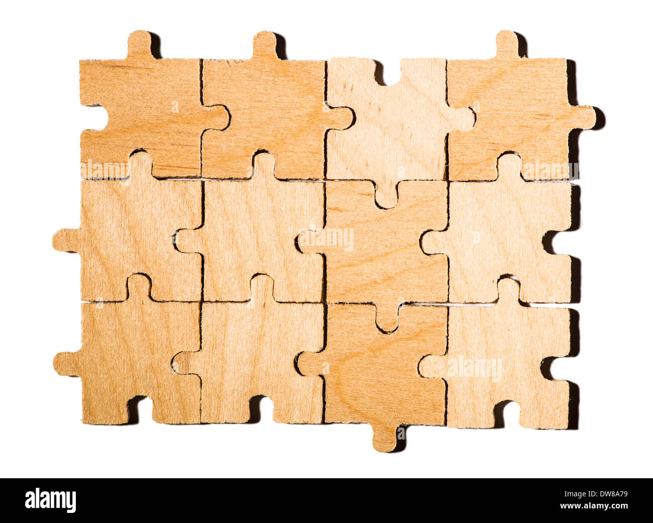 Wooden puzzle on white background. White isolated Stock Photo