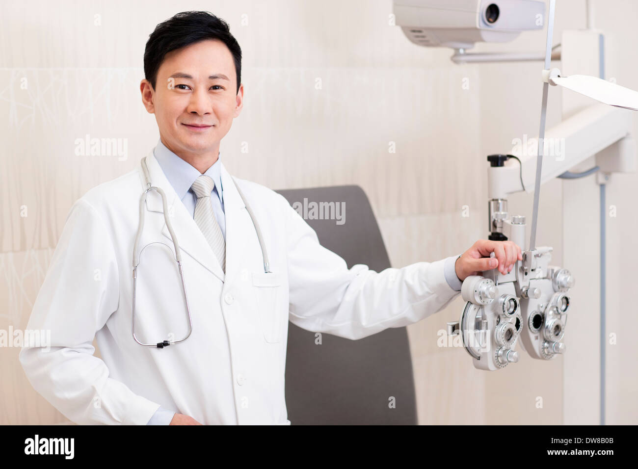 Doctor and medical equipment for eyes checking Stock Photo Alamy