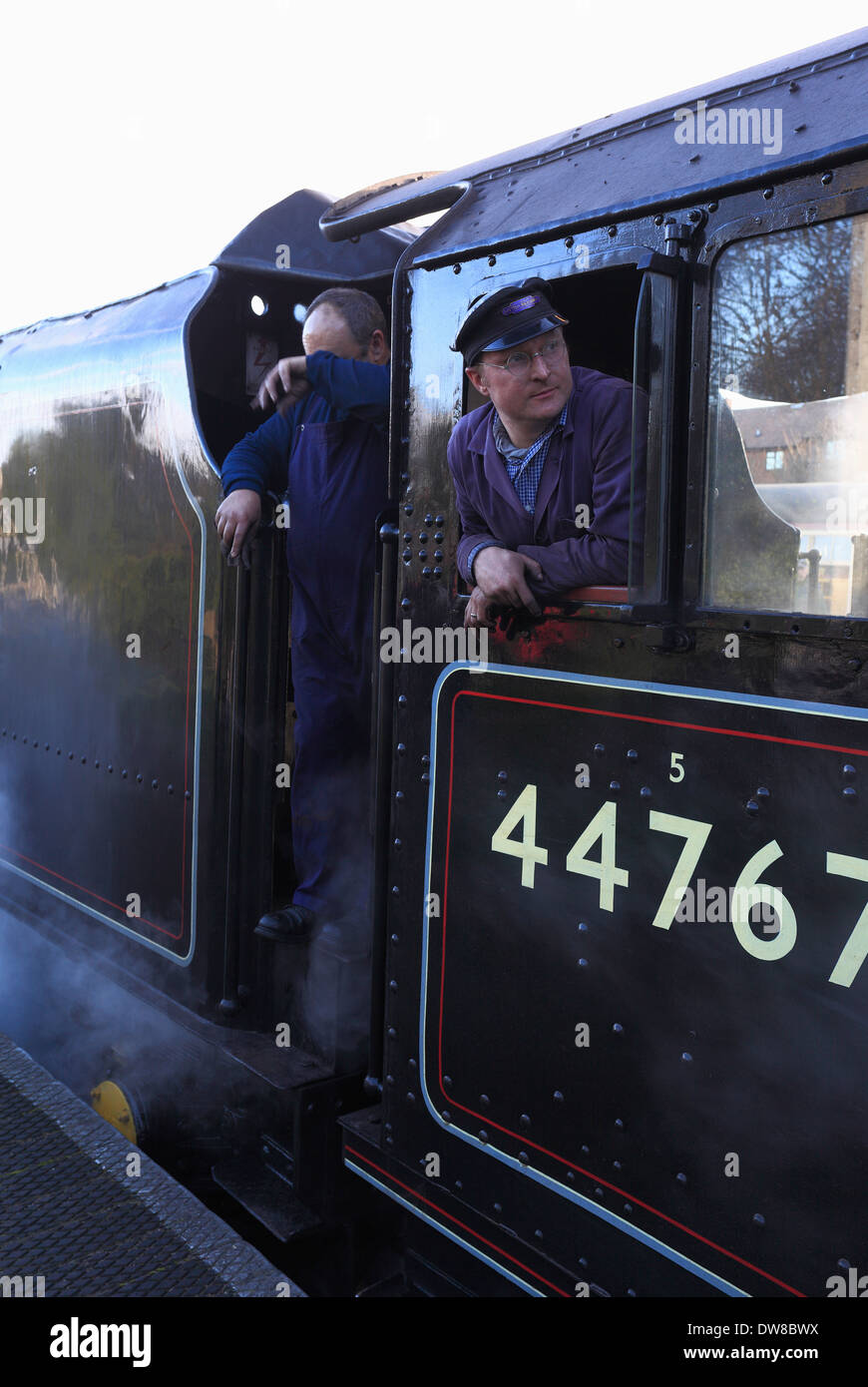 Train drivers on board LMS ‘Black Five’ No 44767 awaiting departure at Sheringham North Norfolk railway station. Stock Photo