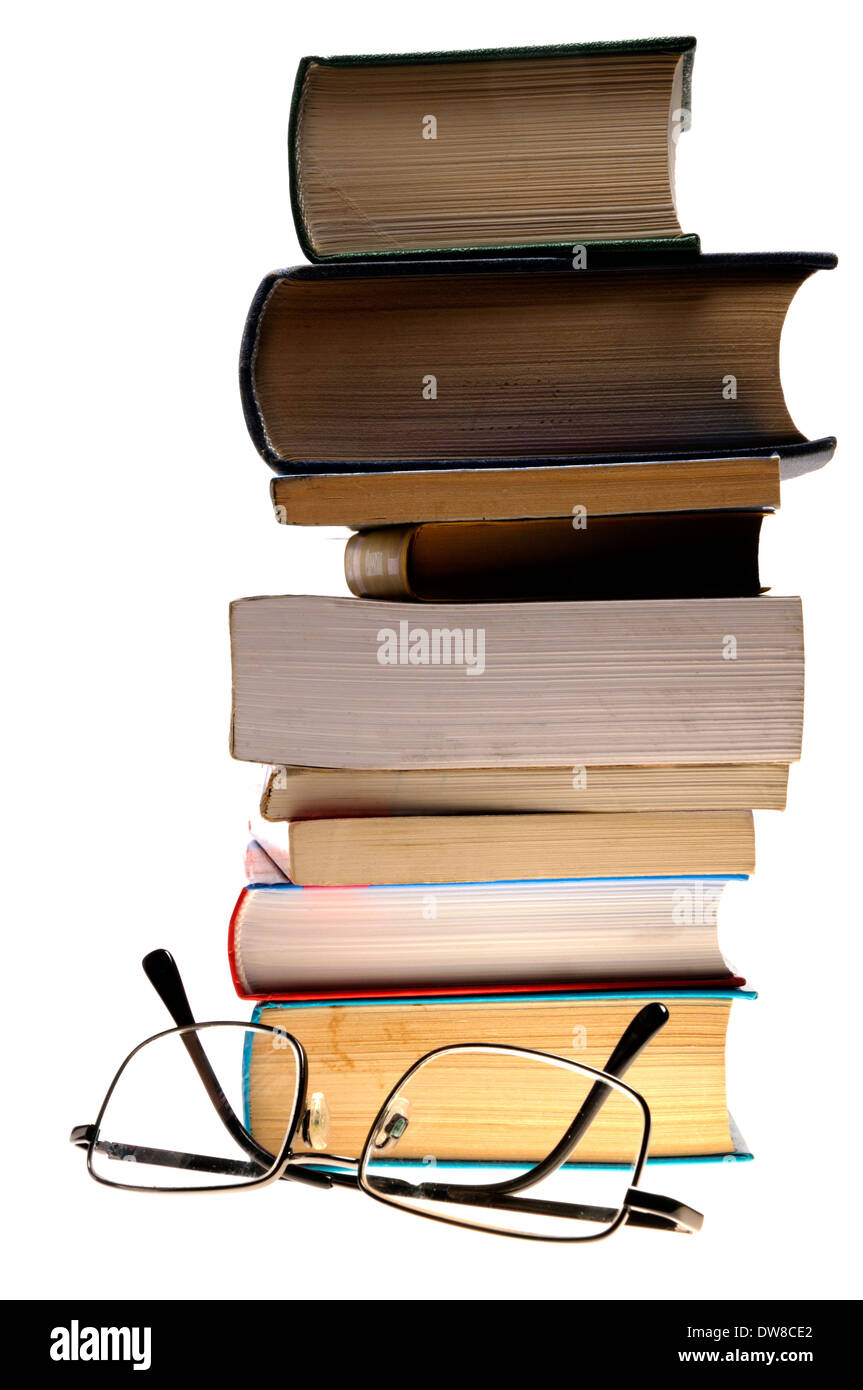 Pile of books and reading glasses Stock Photo