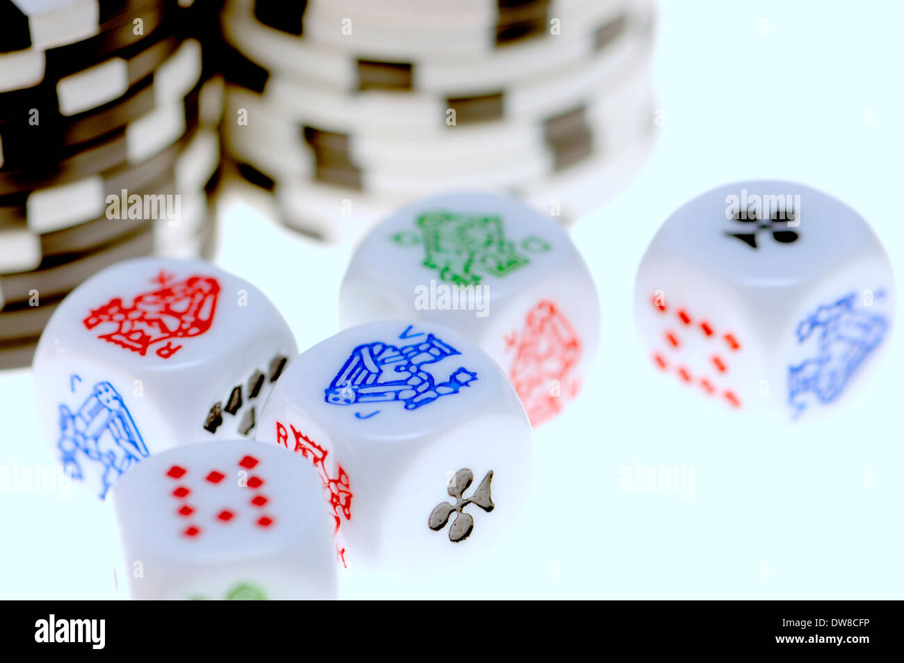 Poker dice and betting chips Stock Photo