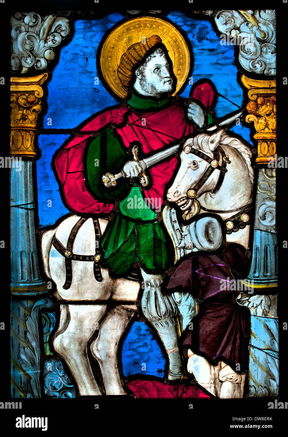 Stained glass window with the Charity of ST Martin 1510  German Germany France French Stock Photo