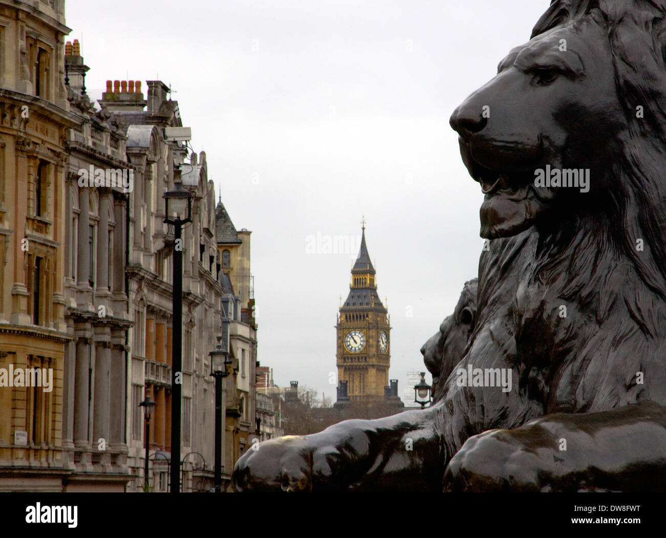 London's Trafalgar square Lions two statues with Big Ben Westminster