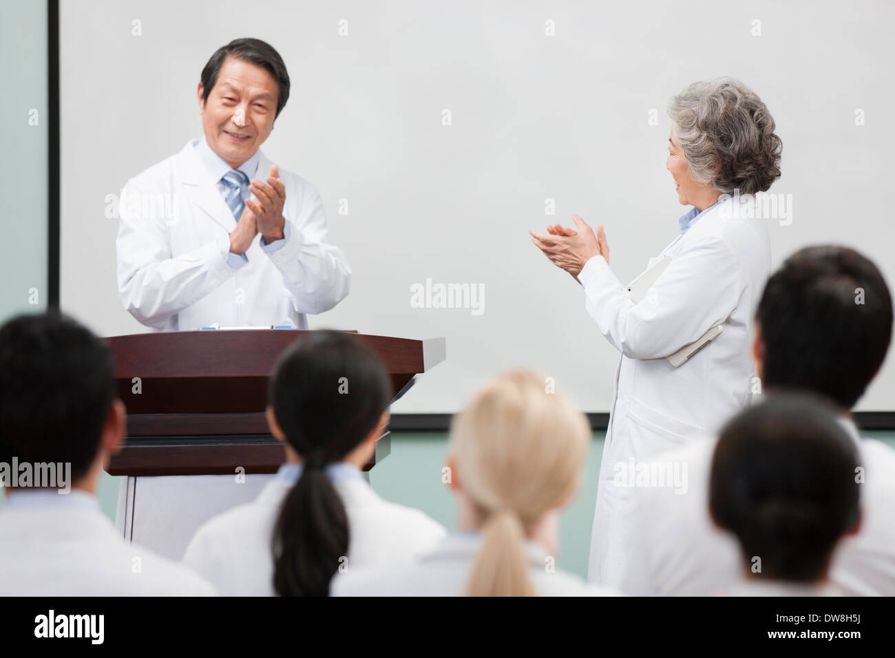 Medical workers clapping in a meeting Stock Photo Alamy