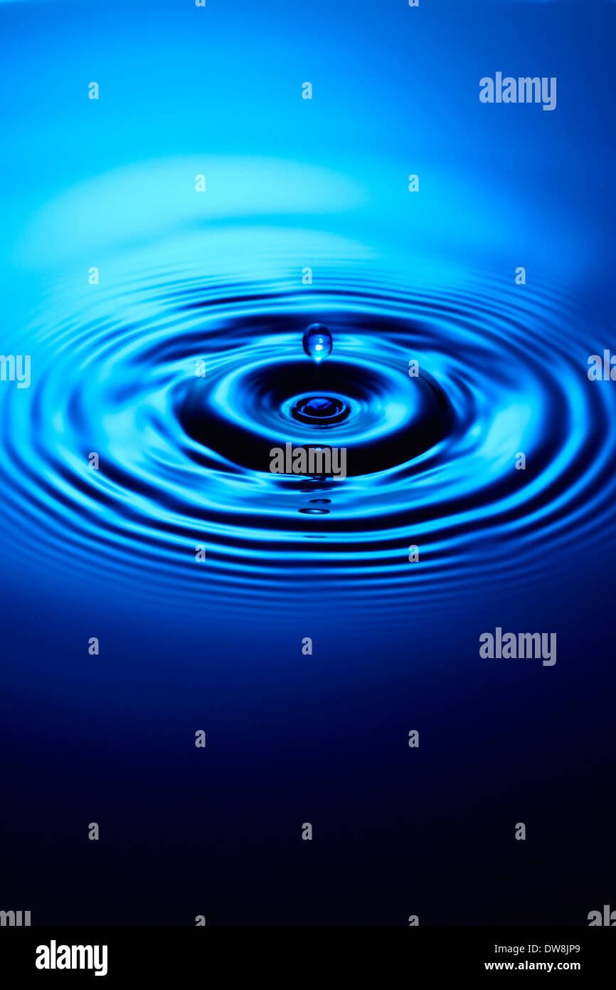 Droplet falling liquid causing ripples hi-res stock photography and ...