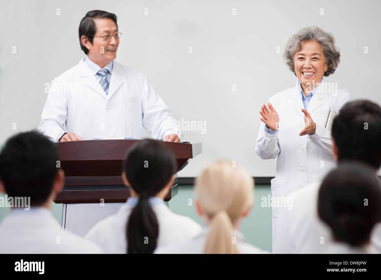Medical workers clapping in a meeting Stock Photo Alamy
