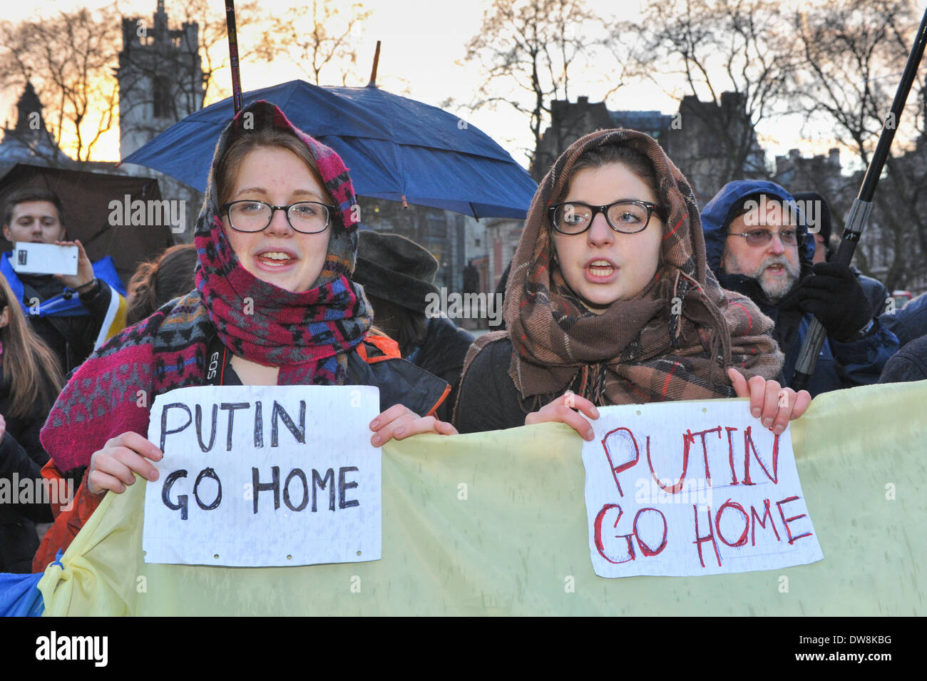 Parliament Square, London, UK. 3rd March 2014. A group of anti-Putin protesters stand opposite the Houses of Parliament. Credit:  Matthew Chattle/Alamy Live News Stock Photo