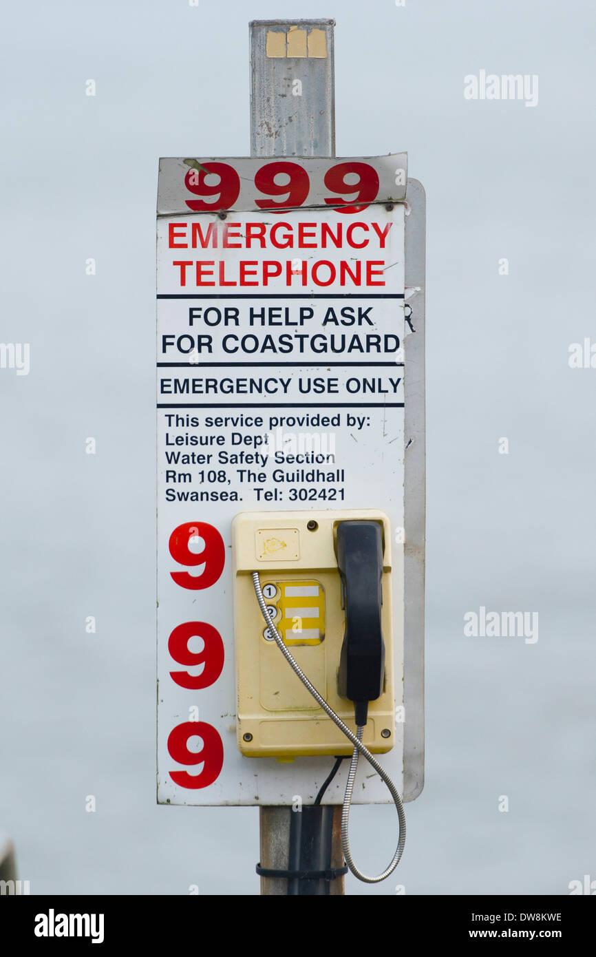 A 999 emergency coastguard telephone at the coast. Stock Photo