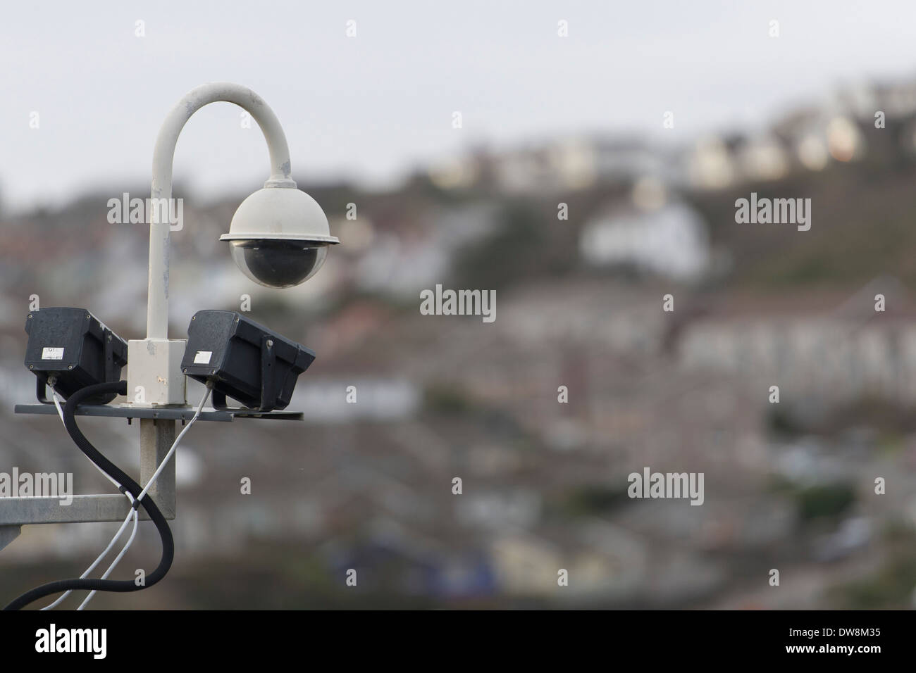 A CCTV security camera overlooking a residential area Stock Photo Alamy