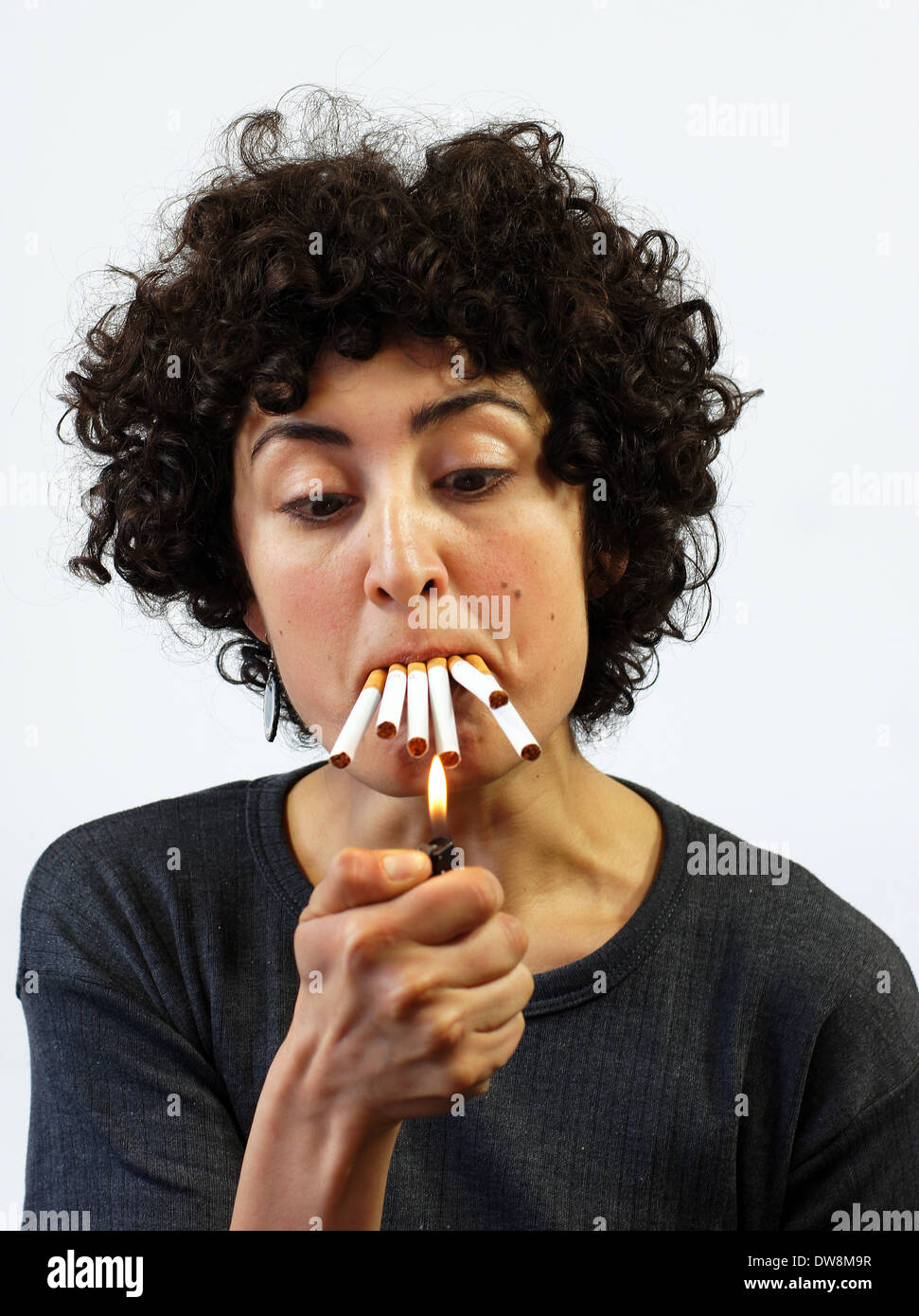 Smoking cigarette funny hi-res stock photography and images - Alamy