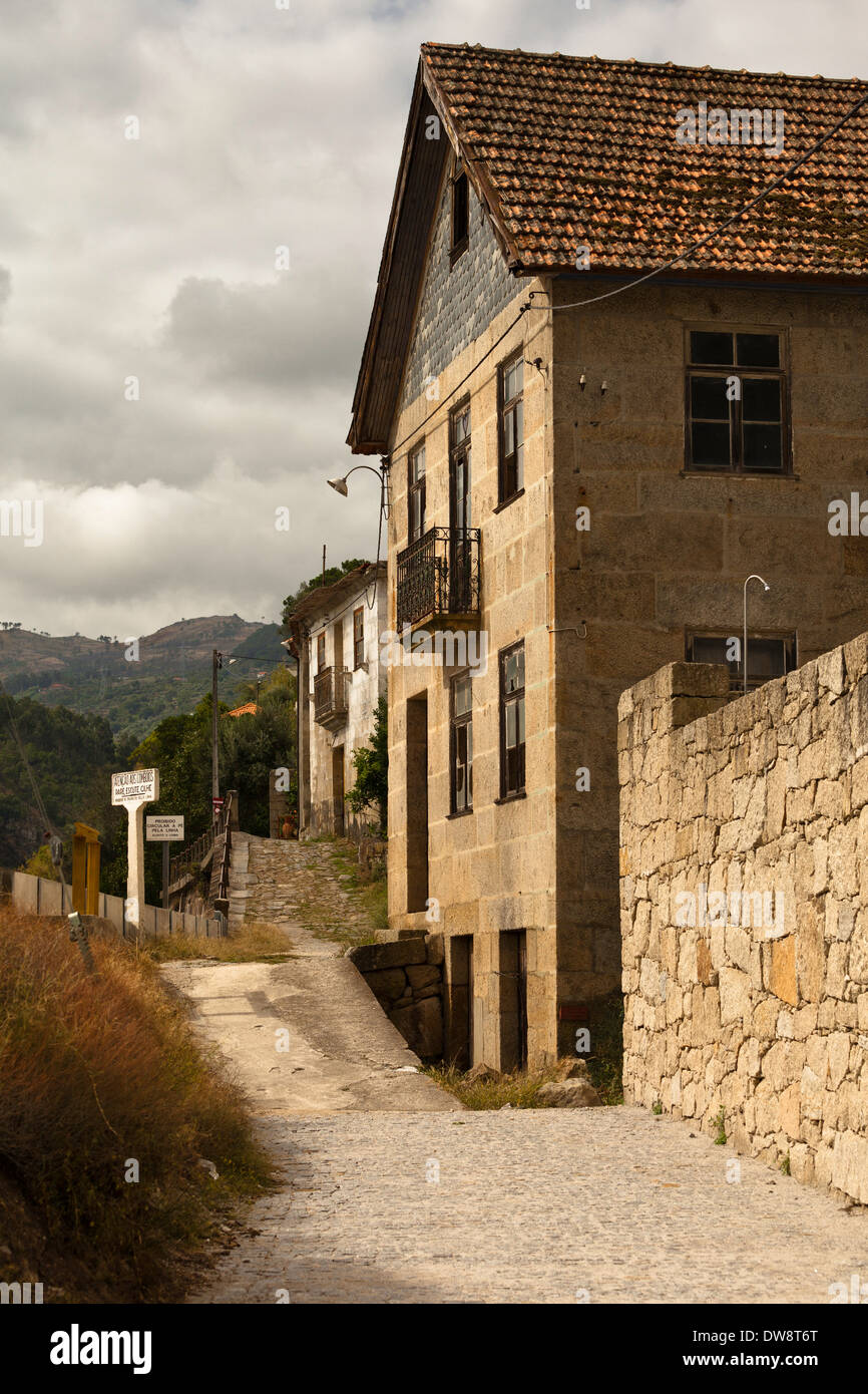 Train stops on signal at Caldas on Rio Duoro in Portugal Stock Photo