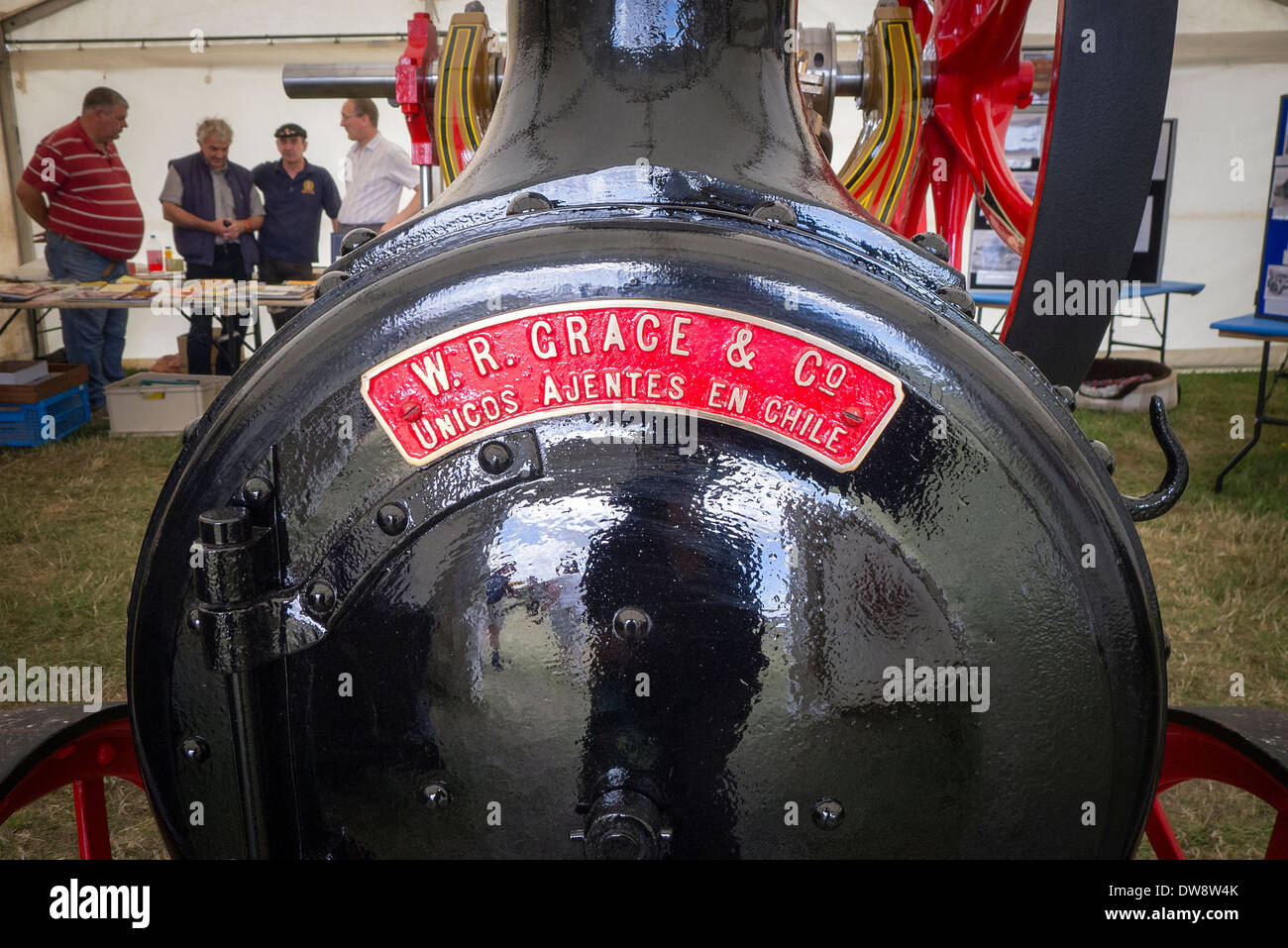 Front of old 1900s British steam engine with importer's name plate in Chile Stock Photo