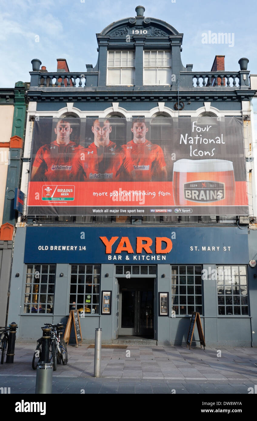 The Yard public house, Cardiff city centre, Wales UK. Welsh Rugby home nations Brains beer sponsors advert Stock Photo