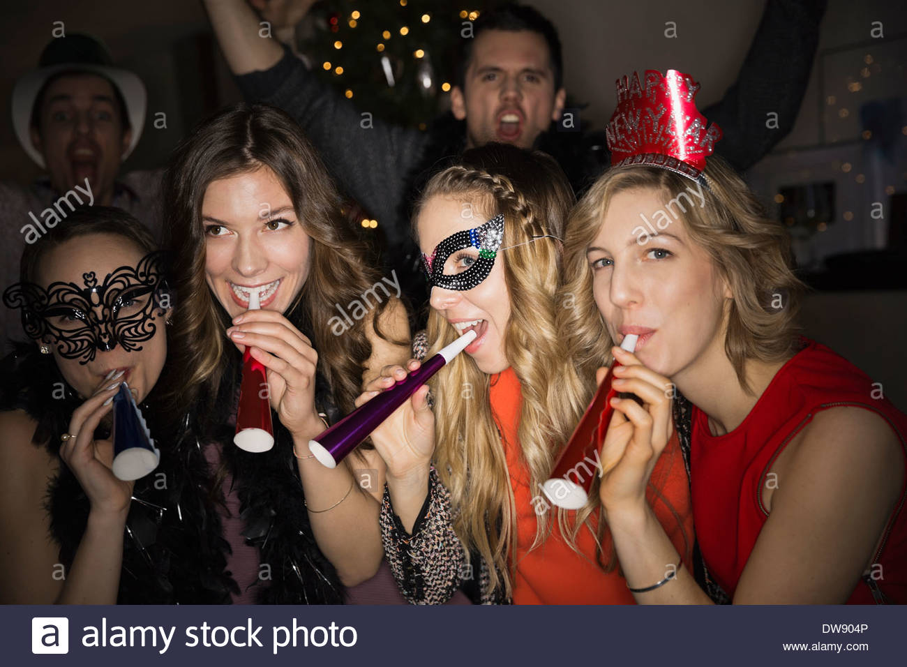 Group of female friends enjoying New Years Eve party Stock Photo
