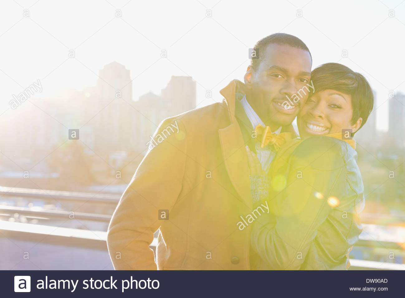 Portrait of loving couple standing outdoors Stock Photo