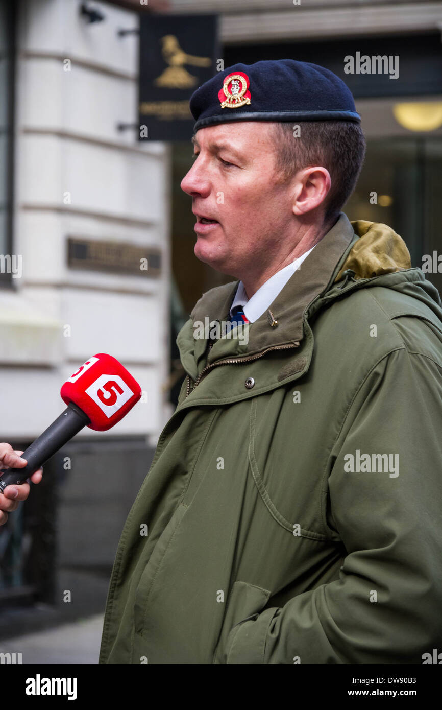 Adam Walker gives an interview outside Old Bailey court in London during the trial of private Lee Rigby's murderers. Stock Photo