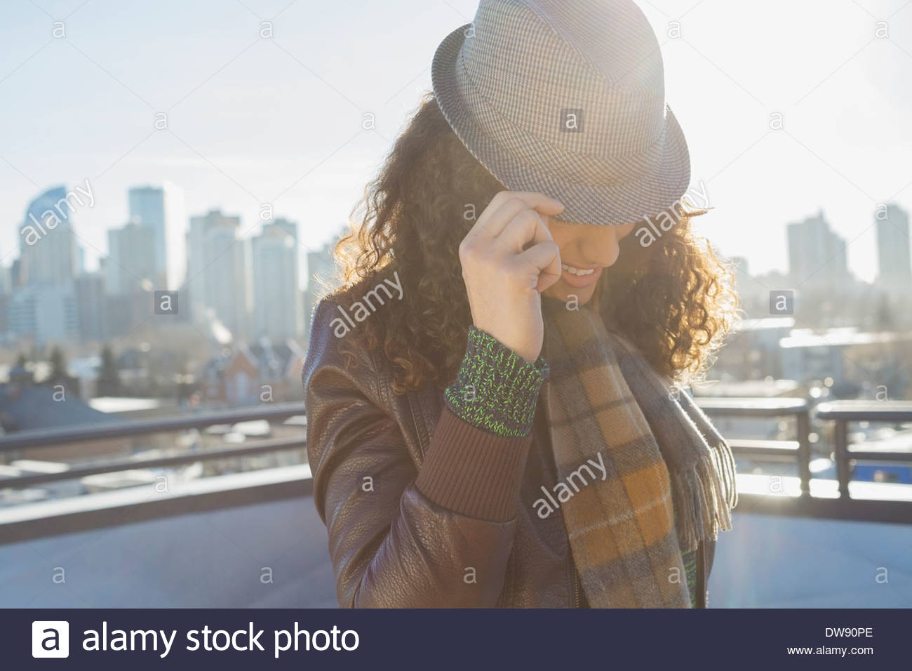 Fashionable woman wearing hat outdoors Stock Photo