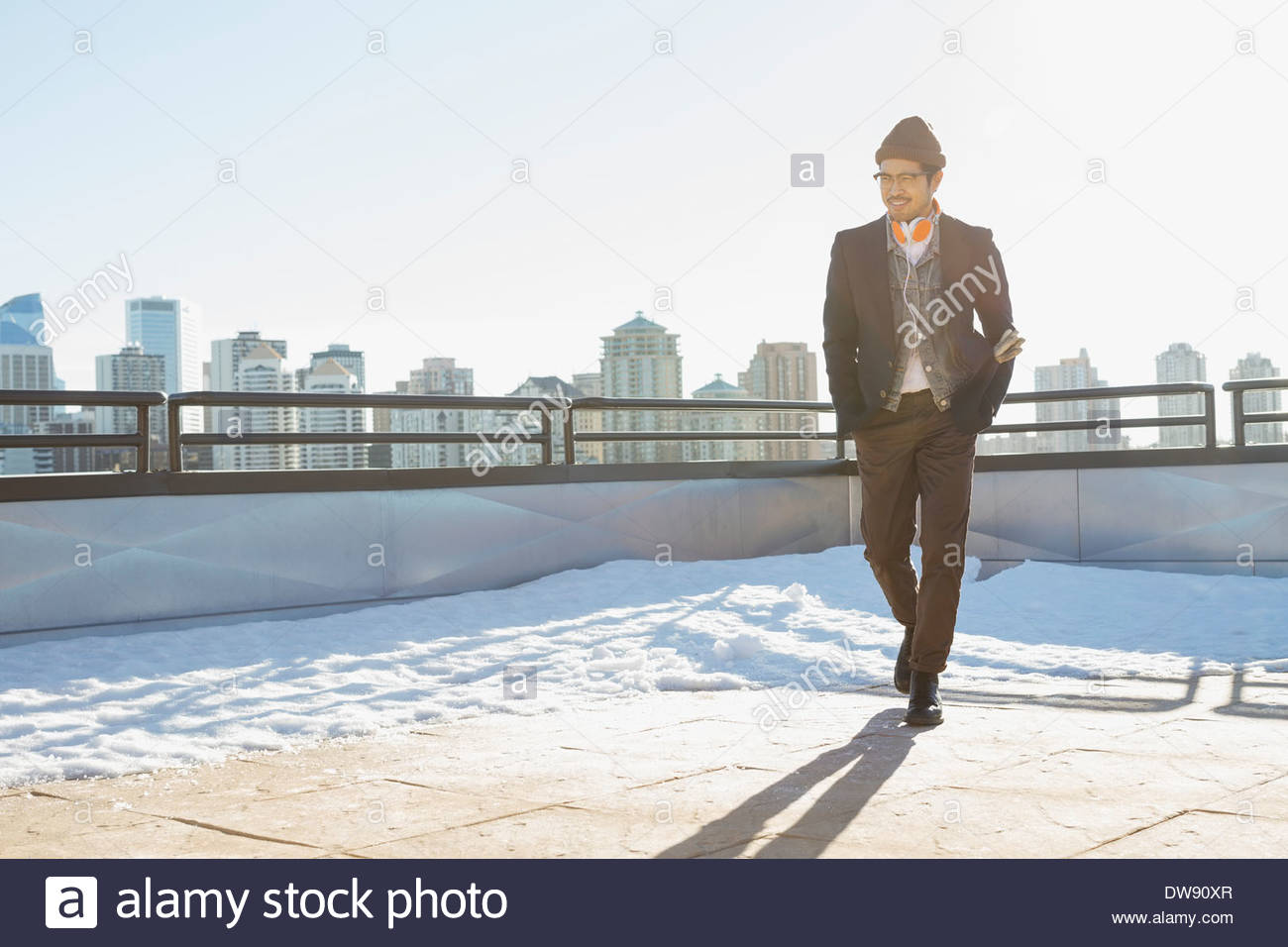Man walking on patio during winter Stock Photo