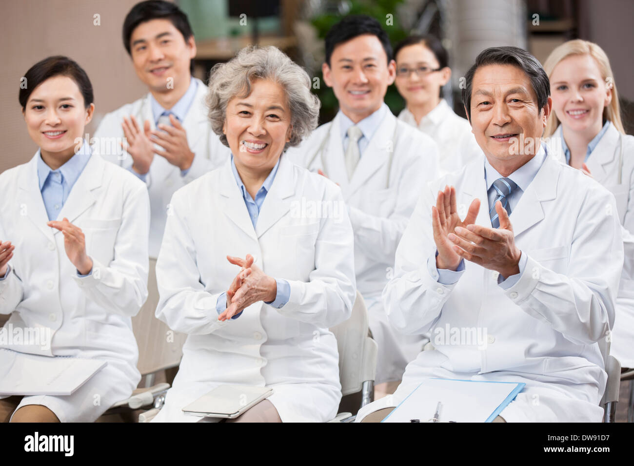 Medical workers clapping in a meeting Stock Photo Alamy