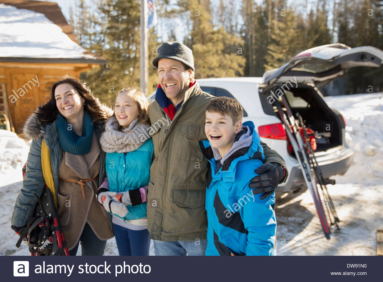 Happy family on ski holiday Stock Photo