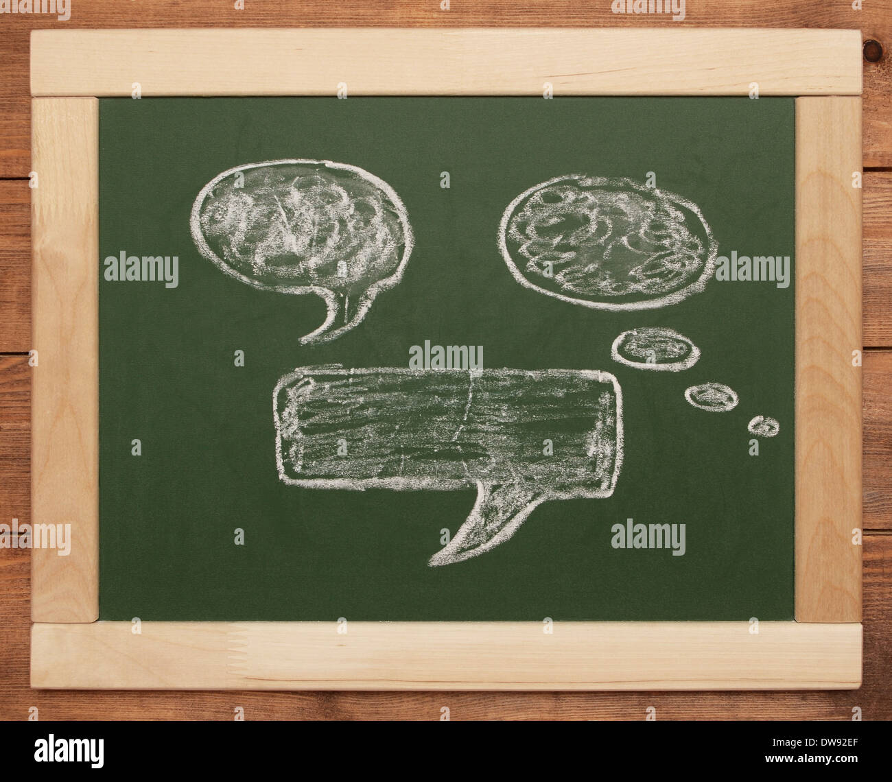 thought bubbles on blackboard Stock Photo