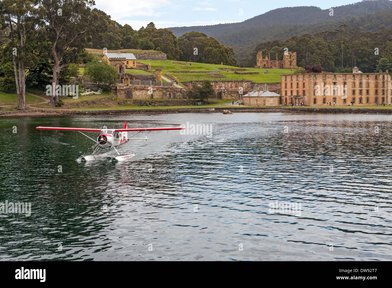 Seaplane and The Penitentiary, old flour mill, Port Arthur, Tasmania, Australia Stock Photo