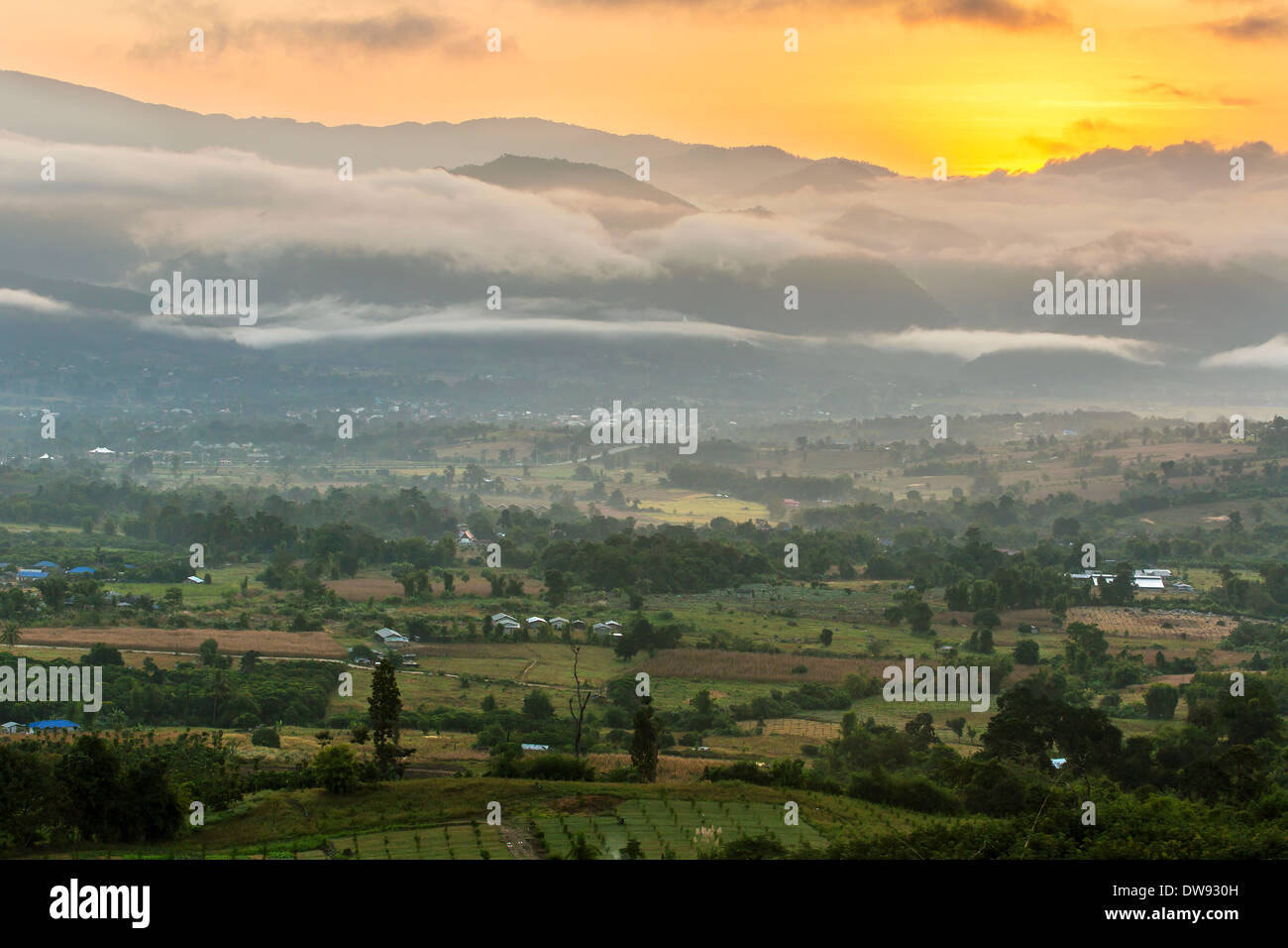 Beautiful sunrise over the valley of c, Northern Thailand Stock Photo