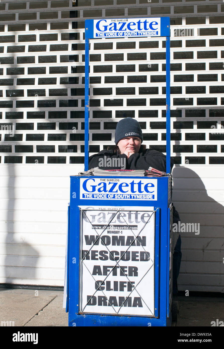 Female newspaper vendor sitting selling Shields Gazette South Shields