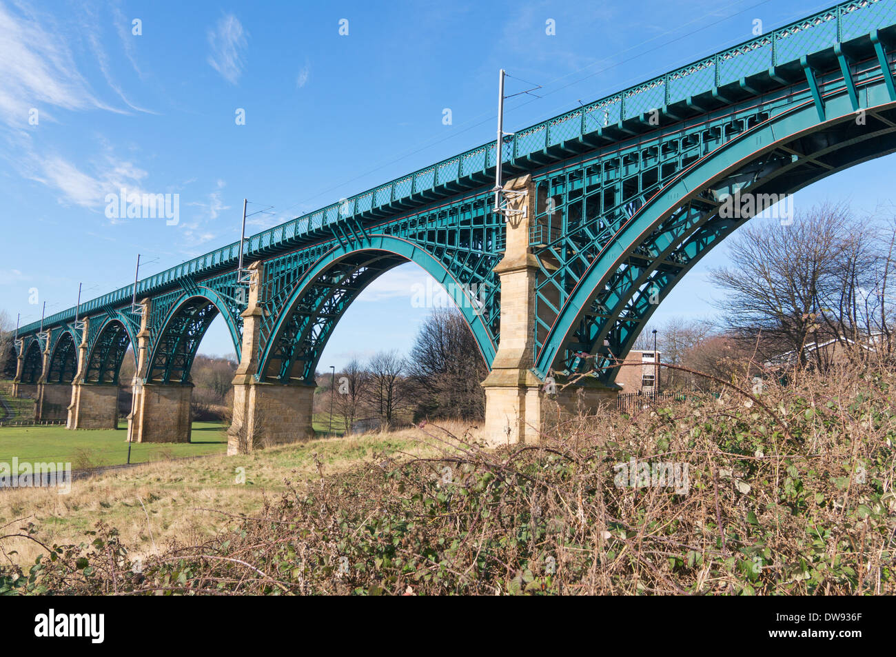 Willington Dene Victorian iron railway bridge or viaduct as used by the Tyne and Wear Metro system, Newcastle north east England Stock Photo