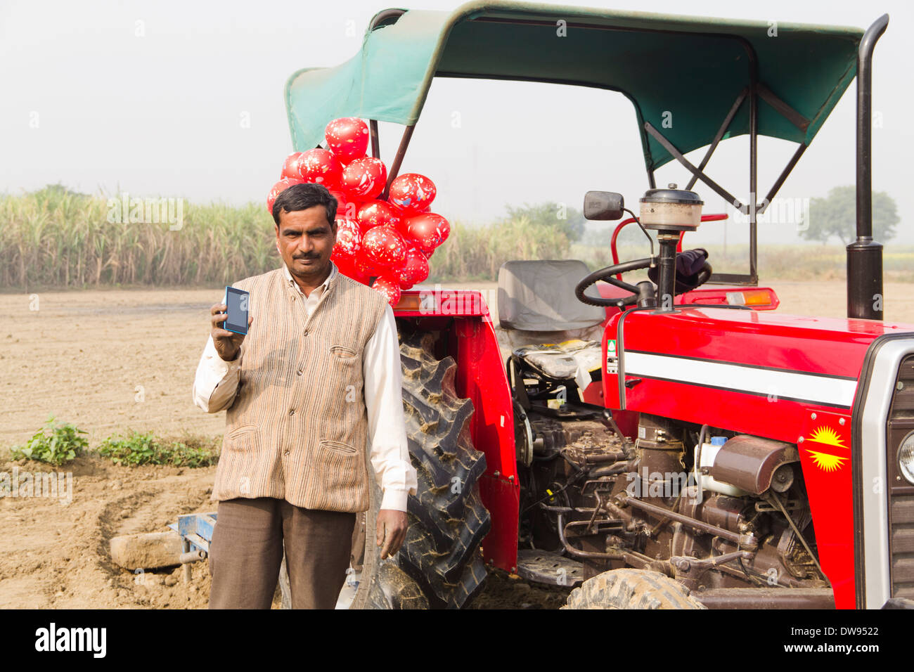 1 Indian farmer Standing In Front Of Tractor Stock Photo - Alamy