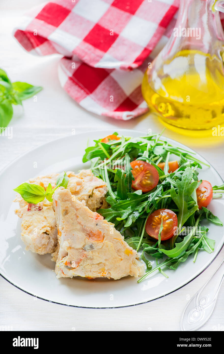 Chicken casserole with vegetables served with green salad, selective focus Stock Photo Alamy