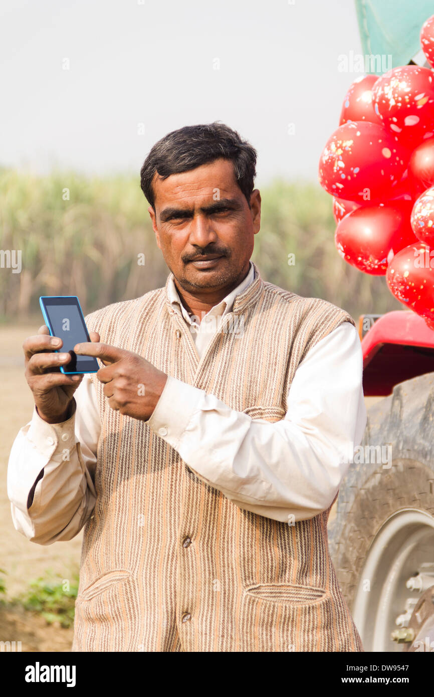 1 Indian farmer Standing In Front Of Tractor Stock Photo - Alamy