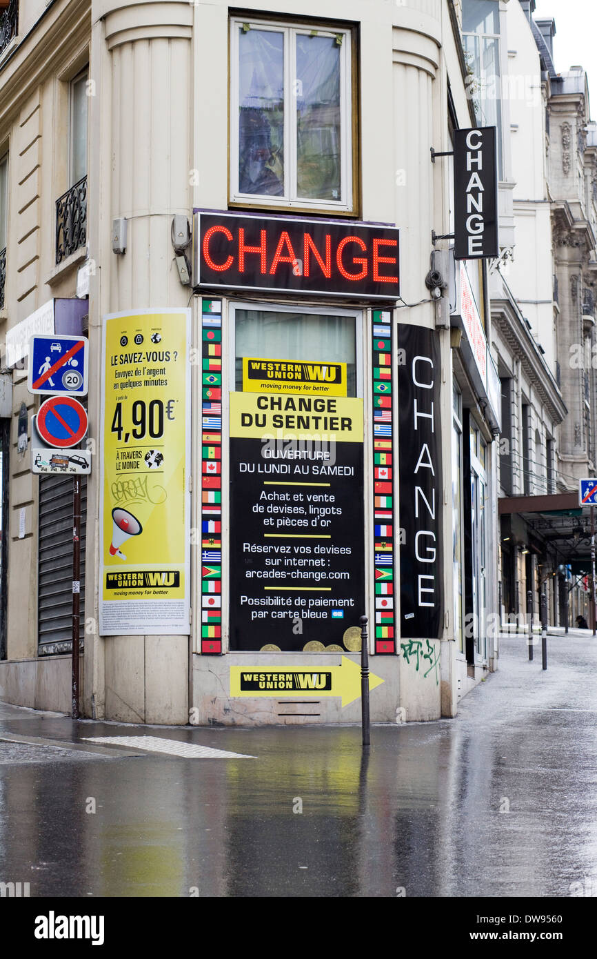 Bureau De Change Exchange Currency on the streets of Paris France in the  Rain Stock Photo - Alamy