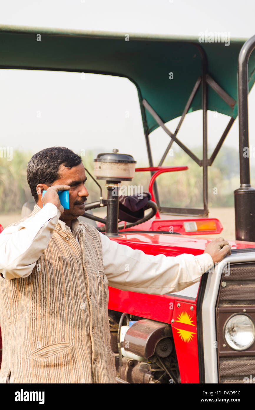 1 Indian farmer Standing In Front Of Tractor Stock Photo - Alamy