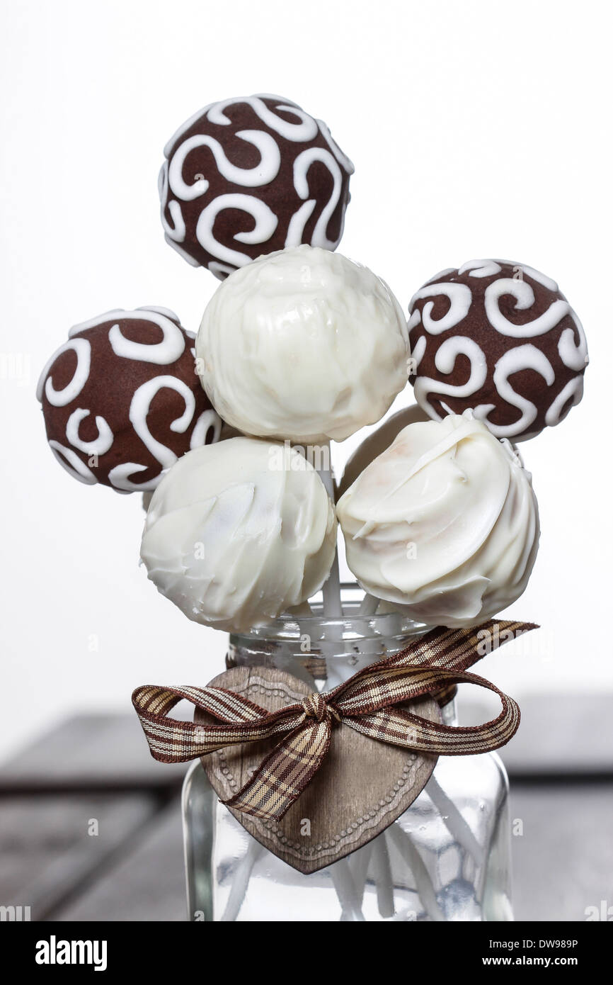 Chocolate cake pops on white backgroundChocolate cake pops on white background Stock Photo