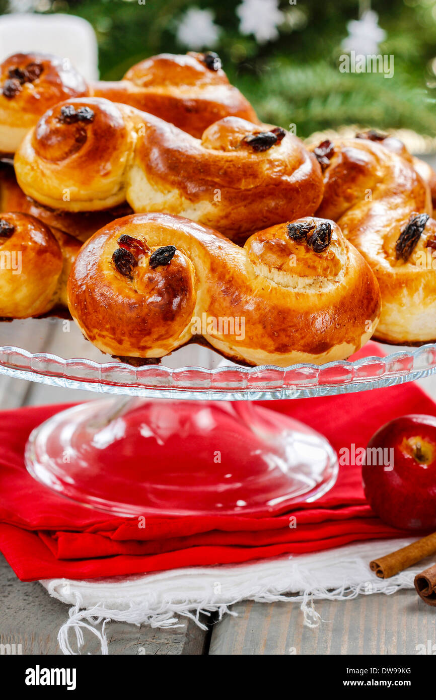 Swedish christmas. Traditional swedish buns in christmas setting. A saffron bun, lussebulle or